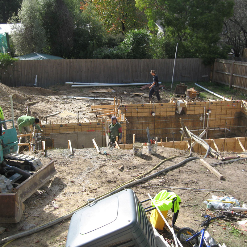 Team working on building a swimming pool