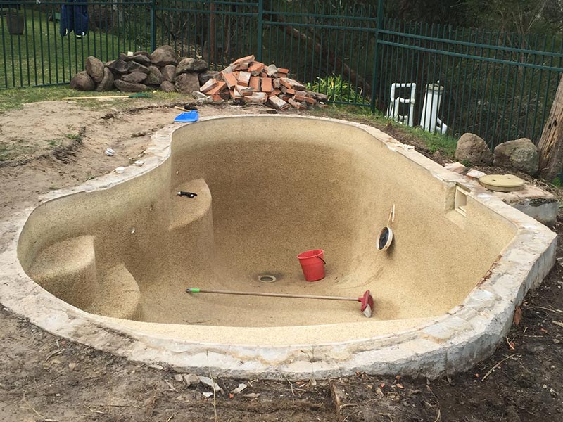 Shell of a cement swimming pool. Work in progress picture.