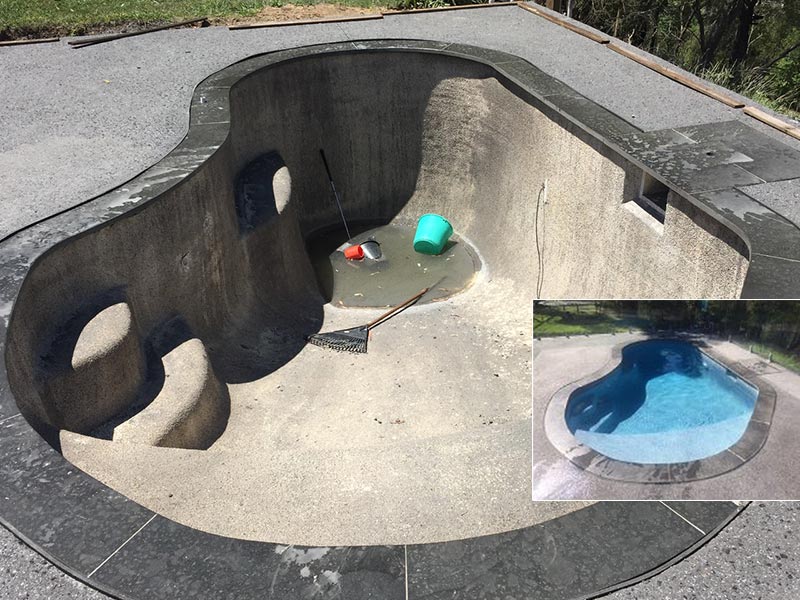 Work in progress picture of a swimming pool with no water.