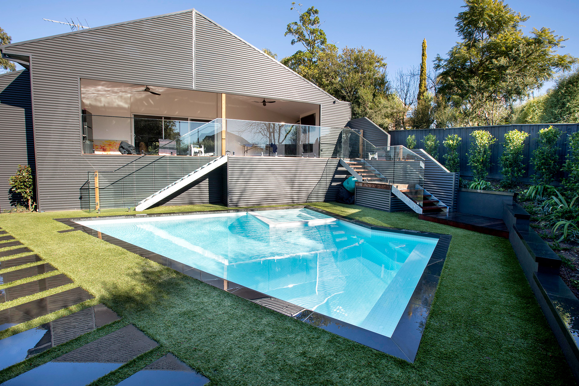 Custom designed swimming pool in garden
